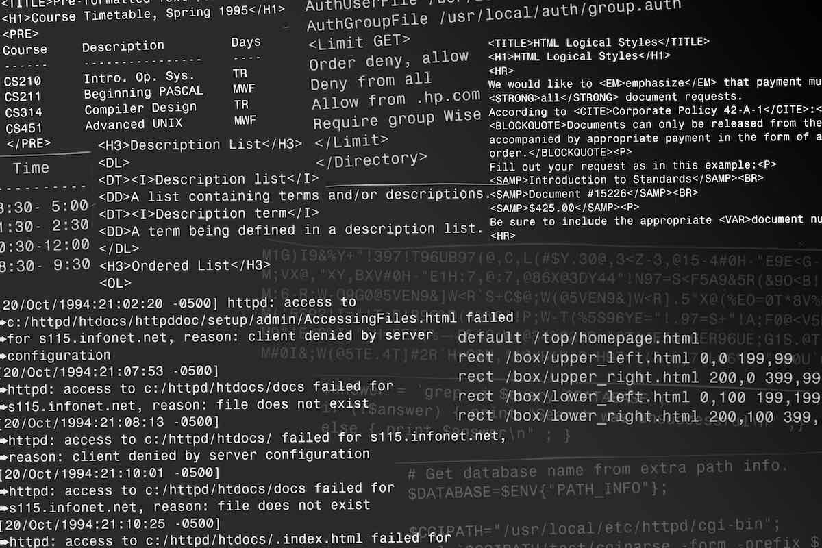 Lines of code on a screen in black and white