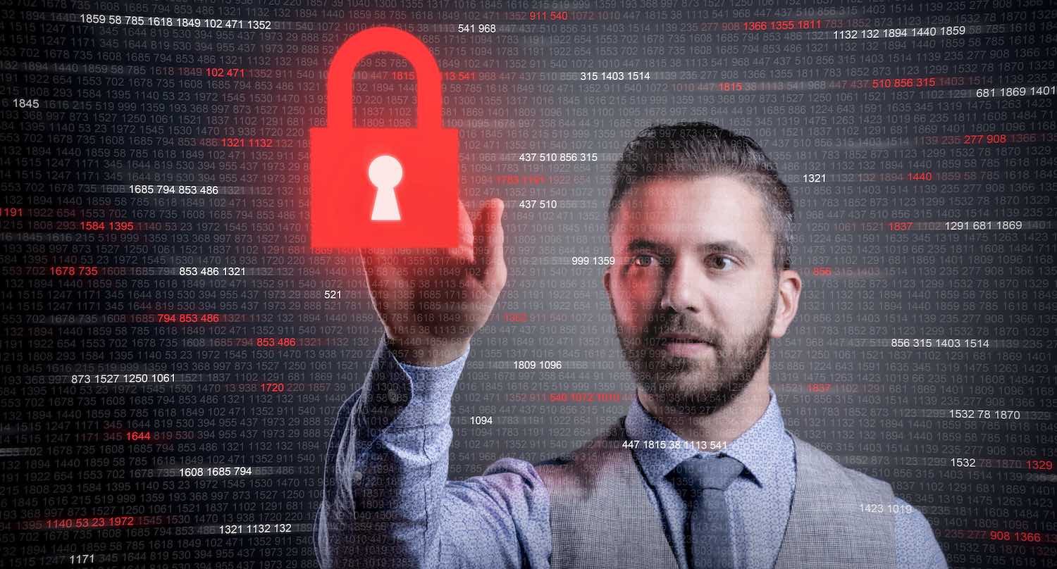 Man touching a red key lock to represent web security