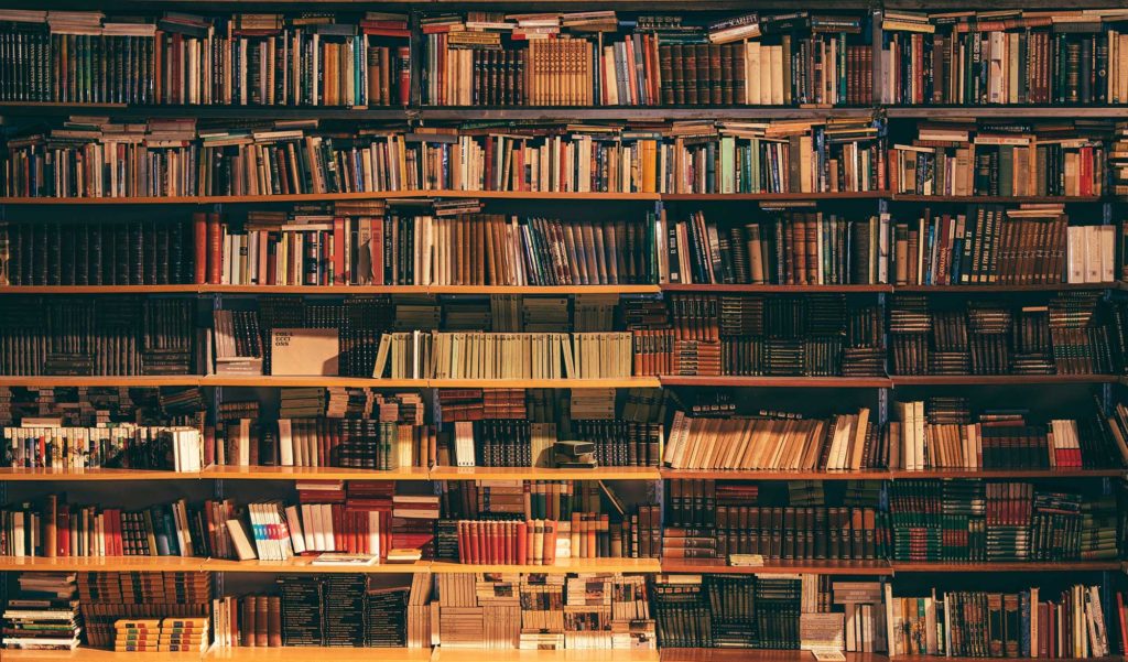 a large bookcase full of books