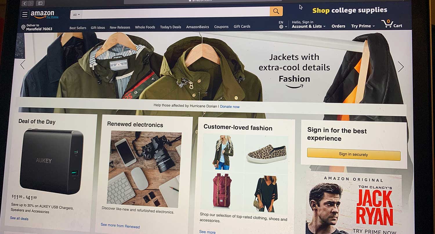 The Amazon homepage on a laptop screen
