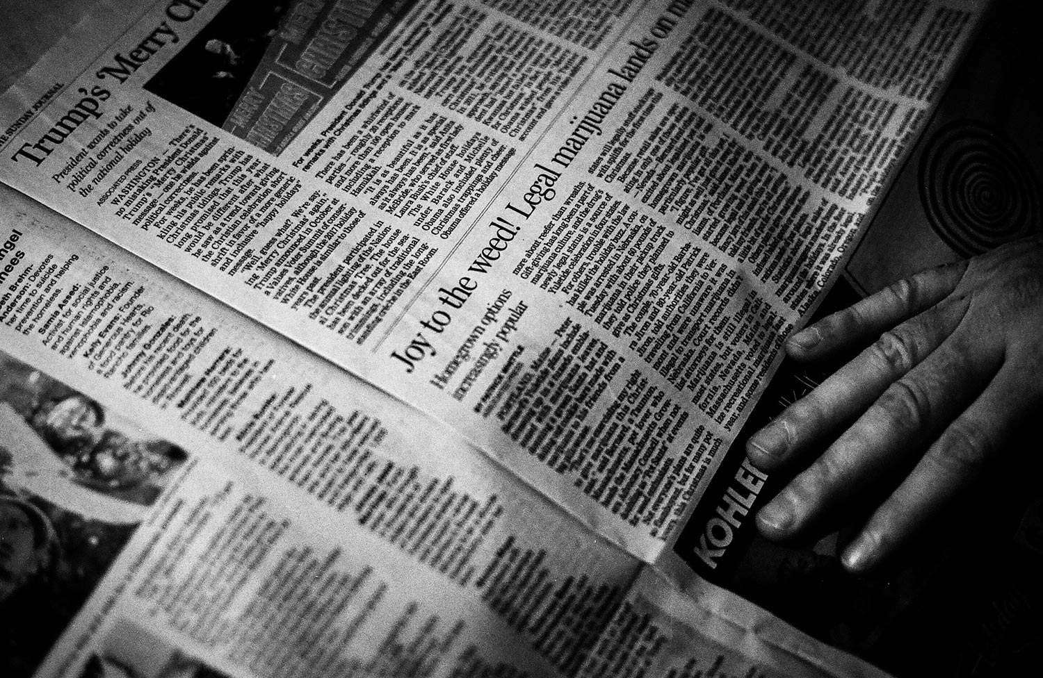 an open newspaper in black and white